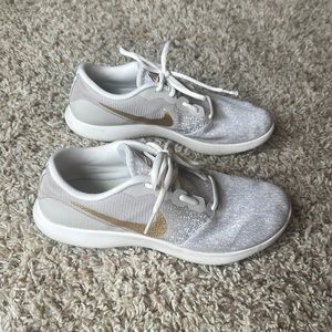 Womens Nike gold and cream gym shoes size 9